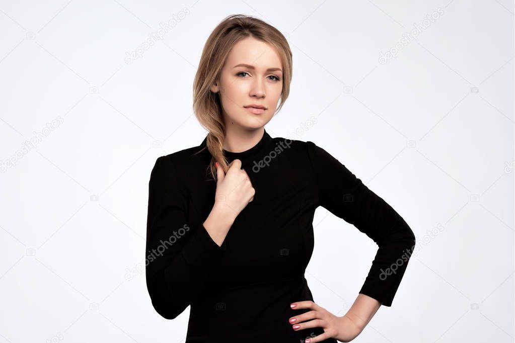 Glamour fashion woman with long blonde hair and natural evening makeup wear black dress.