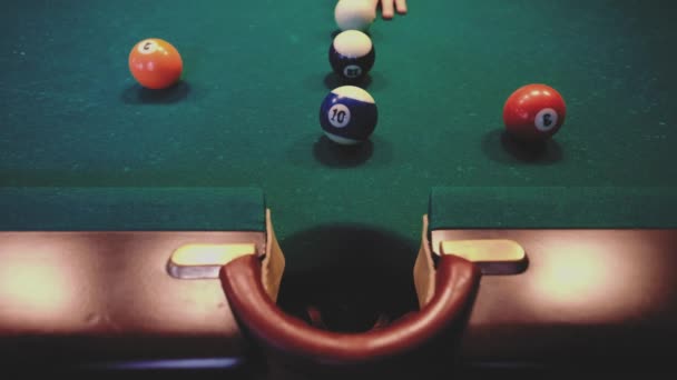 American billiard. Man playing billiard, snooker. Player preparing to shoot, hitting the cue ball. — Stock Video