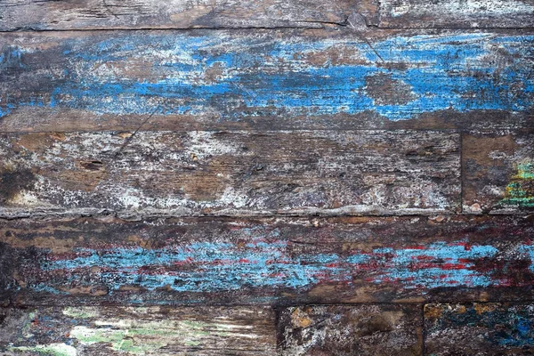 Глиняный фон старой коричневой деревянной доски с красками . — стоковое фото