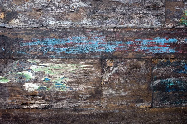 Grunge achtergrond van oude bruin houten plank met bliue verf. — Stockfoto