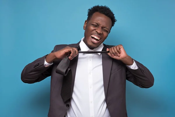 African american business man in suit choking himself being stressed or tired — Stock Photo, Image