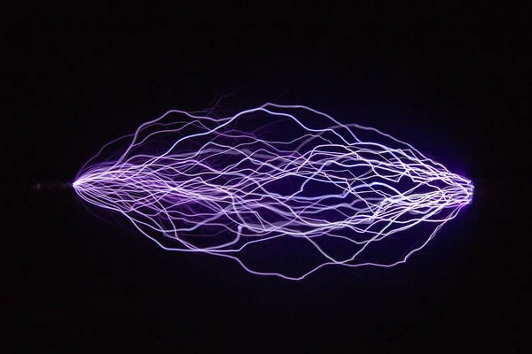 Image of trajectories of electric discharges for student projects. The image is used to study the physical phenomenon