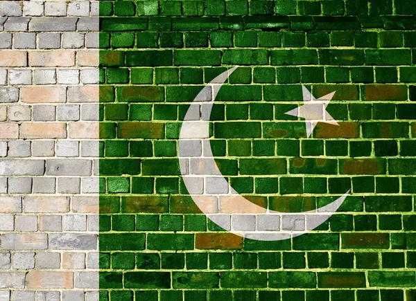 Bandera de Pakistán en una pared de ladrillo — Foto de Stock