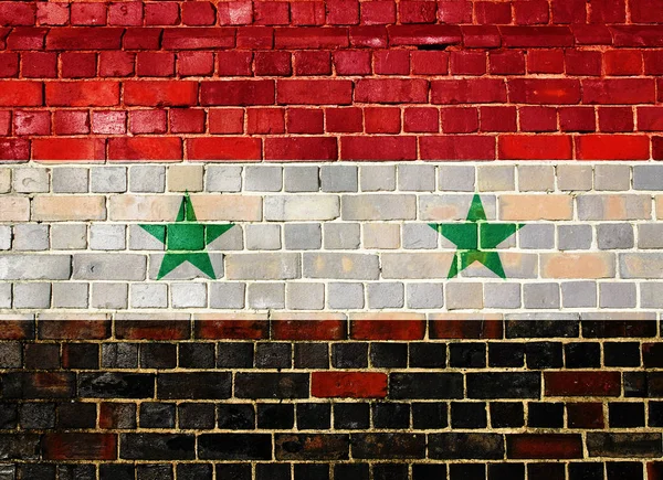 Drapeau syrien sur un mur de briques — Photo