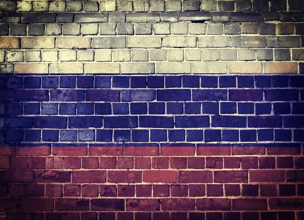 Grunge bandeira da Rússia em uma parede de tijolo — Fotografia de Stock