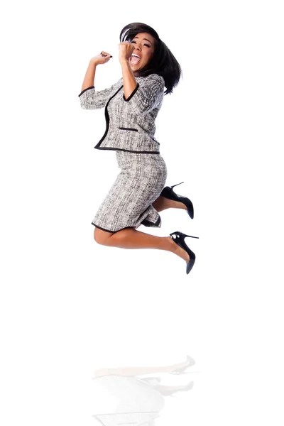 Виграшна ділова жінка стрибає підбадьорює — стокове фото