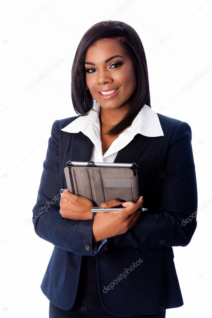 Smiling successful business woman standing with tablet