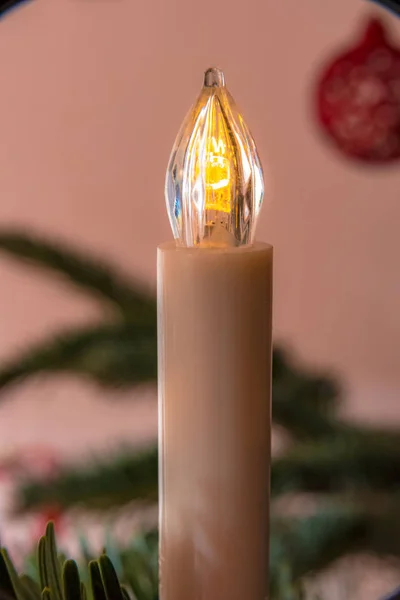 White candle on a Christmas tree — Stock Photo, Image