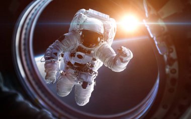 Dünya gezegen ve astronot uzay gemisi pencere Lombar içinde. Nasa tarafından döşenmiş bu görüntü unsurları