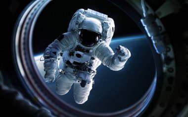 Dünya gezegen ve astronot uzay gemisi pencere Lombar içinde. Nasa tarafından döşenmiş bu görüntü unsurları