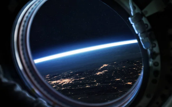 Планета Землі у вікні космічного корабля. Елементи цього зображення, надані НАСА. — стокове фото