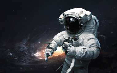 Astronot galaksiye karşı. Bilim kurgu sanatı. Bunun ögeleri 