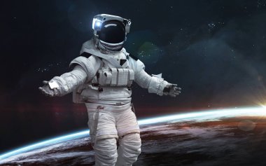 Dünya yörüngesindeki astronot. Bilim kurgu duvar kağıdı. Ögeler