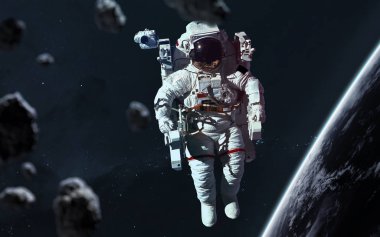 Dünya yörüngesindeki astronot. Bilim kurgu duvar kağıdı. Ögeler