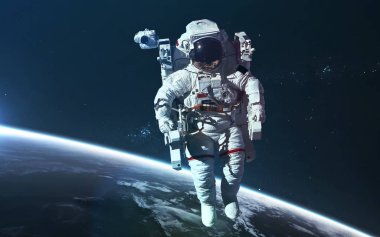 Dünya yörüngesindeki astronot. Bilim kurgu duvar kağıdı. Ögeler