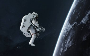 Dünya 'nın yörüngesindeki astronot Eva, bilim kurgu görüntüsü. Elem