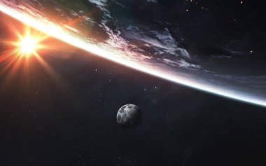 Dünya gezegeninin yörüngesindeki uzay istasyonundan gün doğumu. Ögeler o