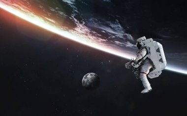 Dünya yörüngesindeki astronot. Bu resim parçasının ögeleri
