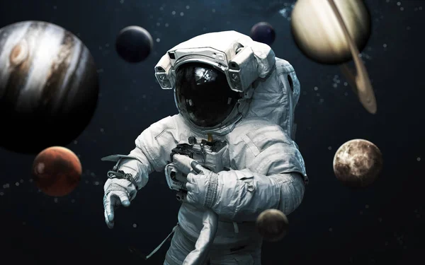 Astronaut und alle Planeten des Sonnensystems. Science Fiction Kunst. — Stockfoto