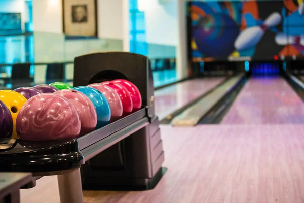 Bowling balls in night club — Stock Photo, Image