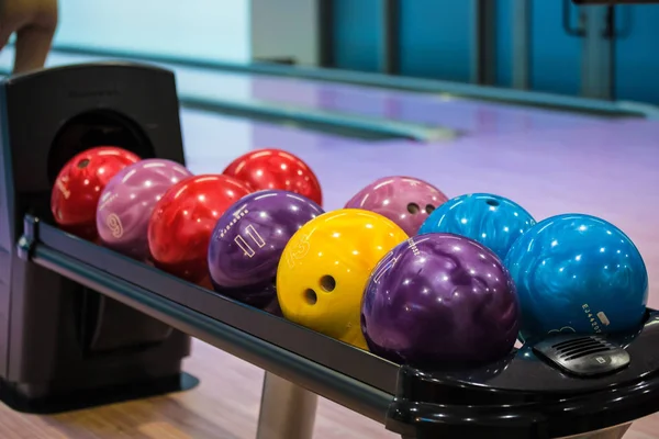 Bowling balls in night club — Stock Photo, Image
