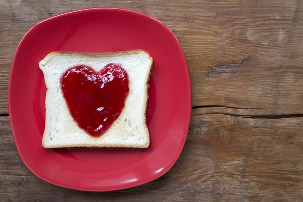 Heart toast on red — Stock Photo, Image