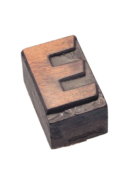 Дерев'яна літерапрес Е блок — стокове фото
