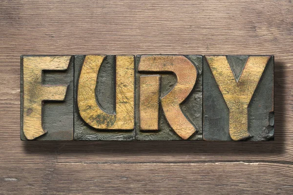 Fury word på trä — Stockfoto