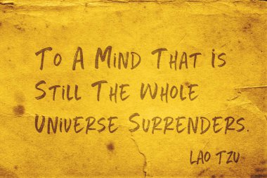 To a mind that is still the whole universe surrenders - ancient Chinese philosopher Lao Tzu quote printed on grunge yellow paper clipart