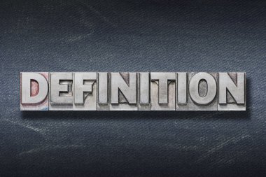 Koyu renk kot arka planda metalik harf baskısından yapılmış tanımlama kelimesi