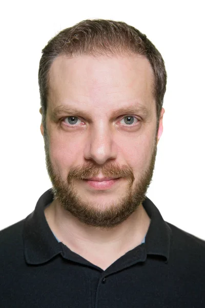 Portrait of adult bearded man against white background. — Stock Photo, Image
