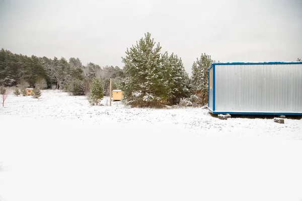 Cabañas en el campo de invierno — Foto de Stock