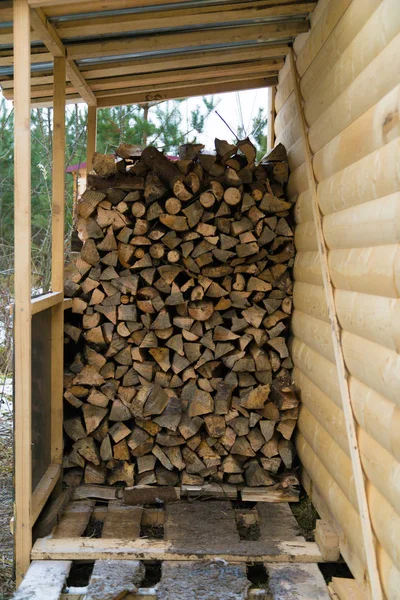 Log store standing near the sauna. — Stock Photo, Image