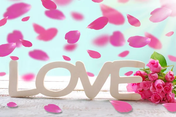 Romantic love background with falling rose petals — Stock Photo, Image