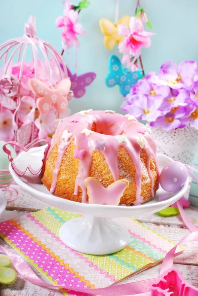 Easter ring cake with pink icing on the top — Stock Photo, Image