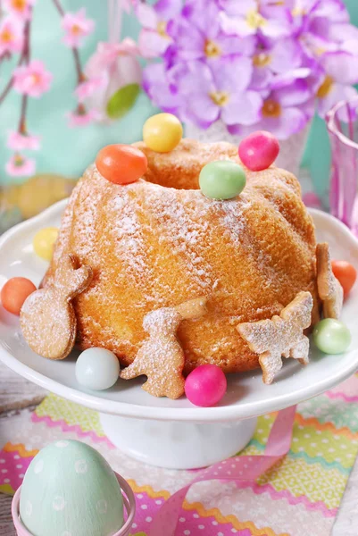 Easter ring cake with colorful candy eggs on the top — Stock Photo, Image