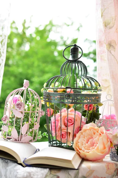 Vintage style decoration with diary and bird cages Stock Picture