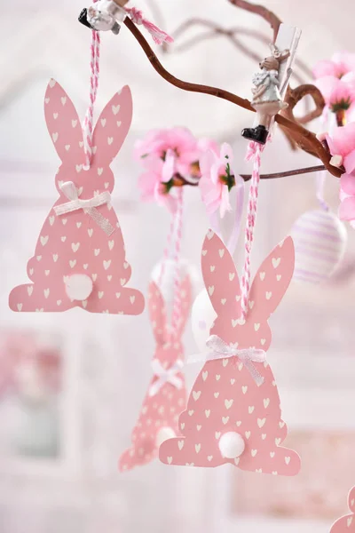 Easter decoration with paper rabbits hanging on willow branch — Stock Photo, Image