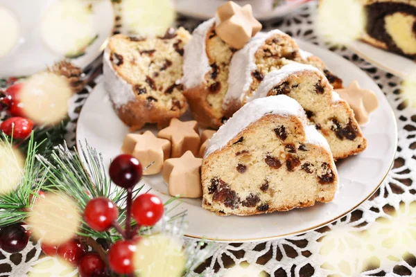 Christmas stollen cake on festive table — Stock Photo, Image