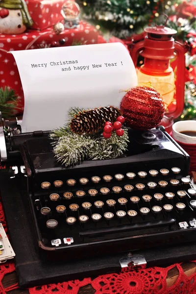 Christmas wishes typed on vintage typewriter — Stock Photo, Image