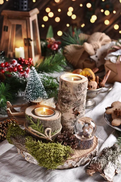 Rustic style Christmas decoration with wooden candle holders — Stock Photo, Image
