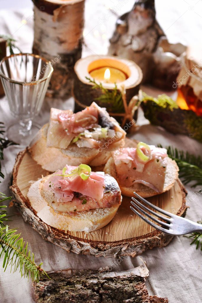 mini canapes with herring with ginger and onion for Christmas