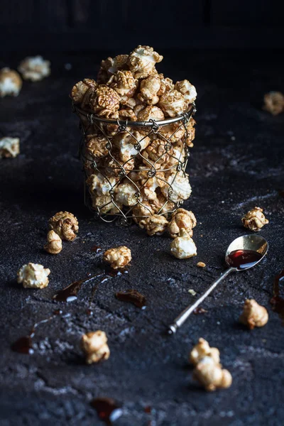 Caramel Popcorn and spoon — Stock Photo, Image