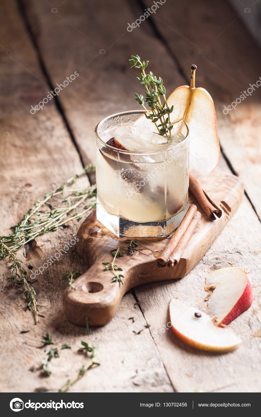 Cold pear white tea with thyme, cinnamon and honey Stock Photo by