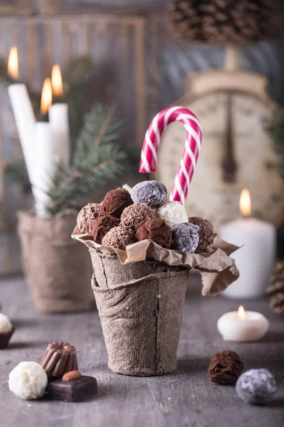 Handmade chocolate candies in paper pot