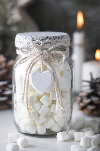 Gift glass jar with marshmallows for Christmas