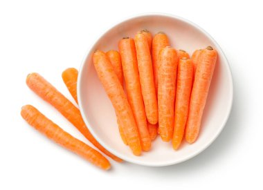 Baby Carrots in Bowl Isolated on White Background clipart