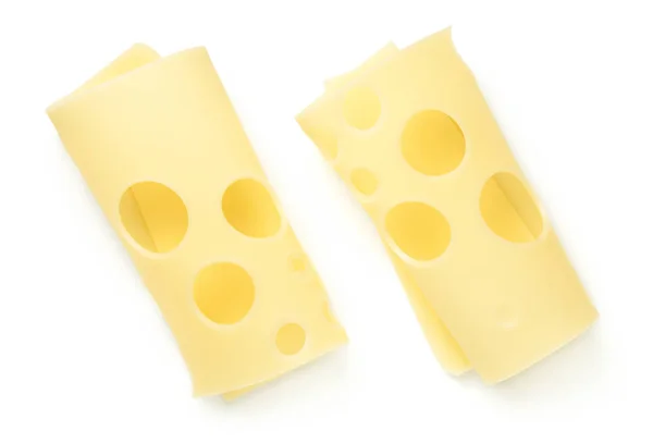 Rebanadas de queso emmental aisladas sobre fondo blanco Imágenes de stock libres de derechos