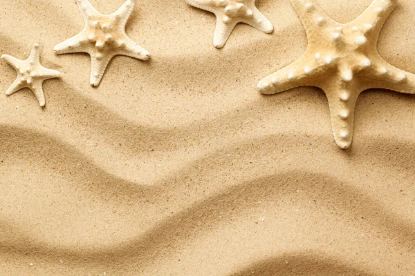 Starfishes Φόντο Άμμου Στο Πάνω Μέρος Επίπεδη — Φωτογραφία Αρχείου