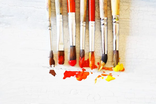 Paints and brushes — Stock Photo, Image